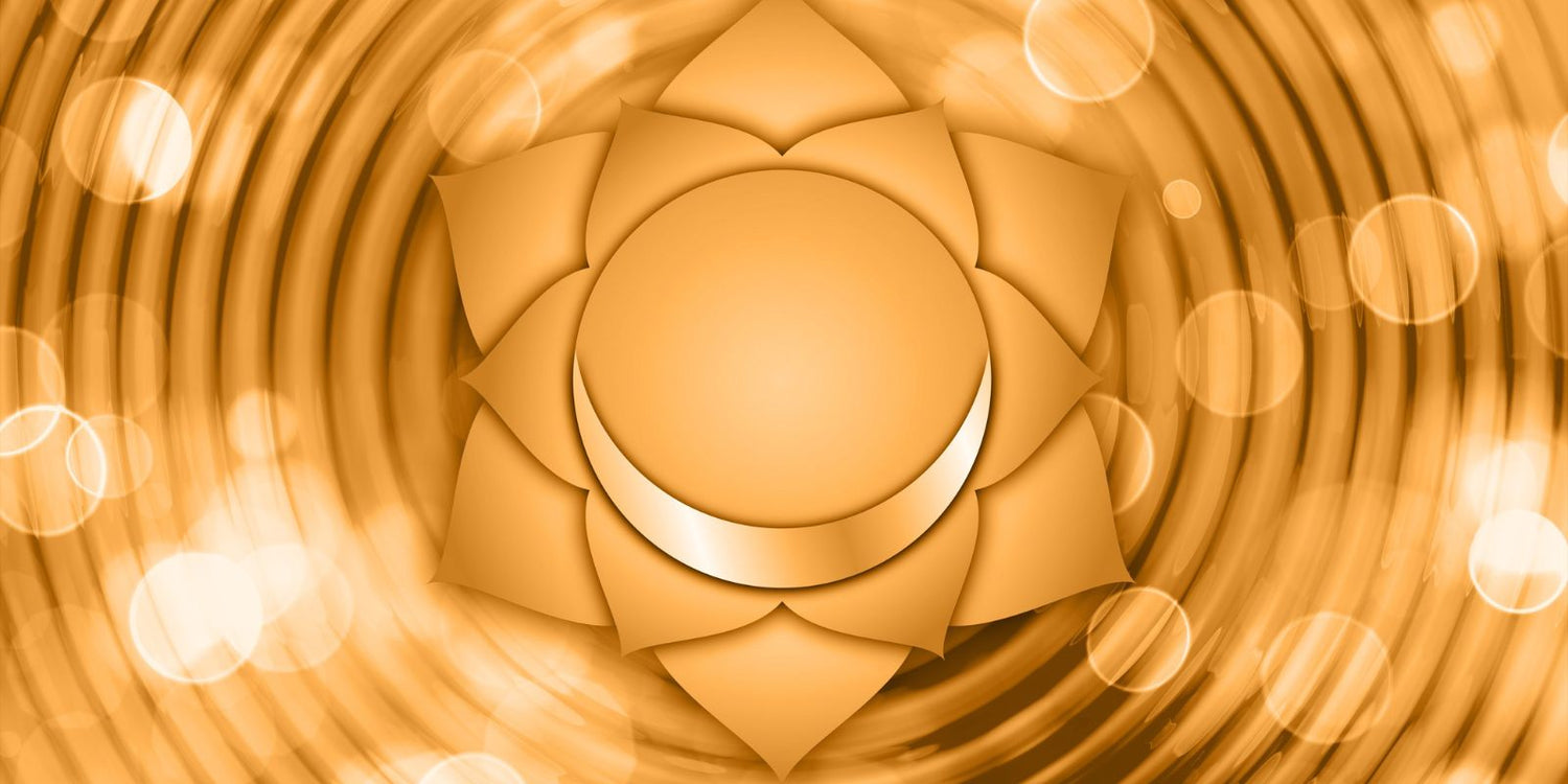 Symbole du chakra sacré sur fond orange