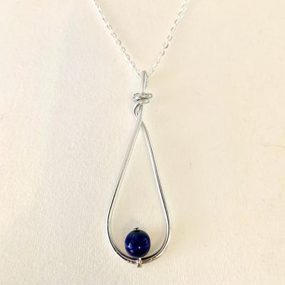 Boutique de Lithothérapie en ligne - Pendentif argenté et perle Lapis Lazuli